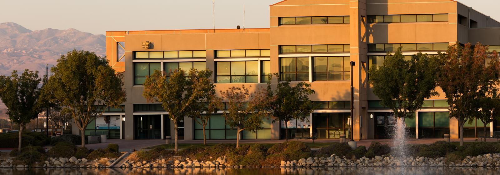 Campus view of lake and building